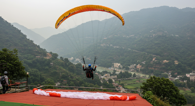 Image for the article 'Relish the Sky: Your Ultimate Guide to Paragliding in Rishikesh' regarding Tourism.